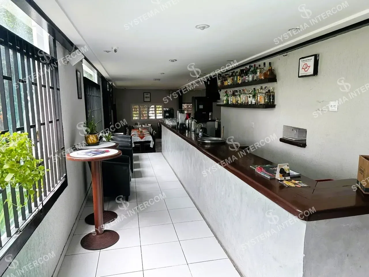 Pizzaria de esquina com o Predio na Zona Leste